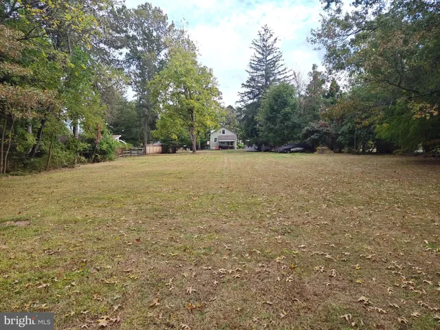 a view of an empty room with trees