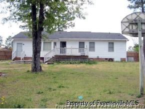 3360 Red Fox Road Spring Lake, NC 28390 - Photo 2 of 8 a front view of house with yard and trees