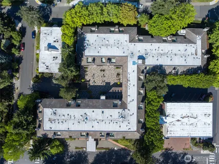 an aerial view of a house with outdoor space