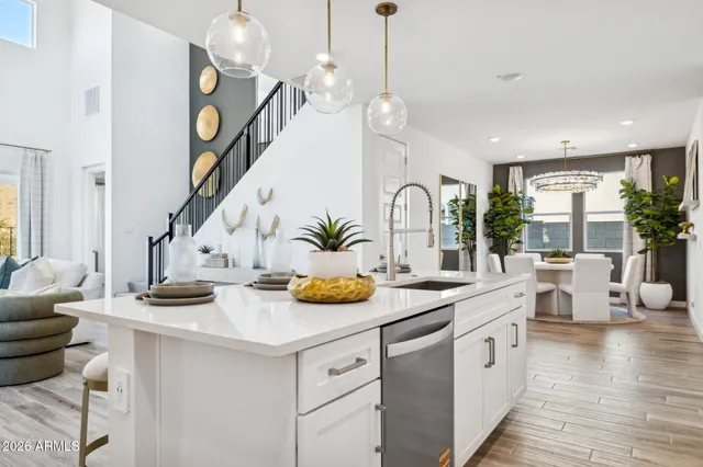 a very nice looking dining room with a table and chairs