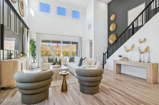 a living room with furniture and a table