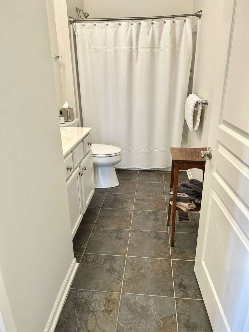 2603 Avondale Circle Naperville, IL 60564 - Photo 13 of 22 a bathroom with a sink toilet and tub