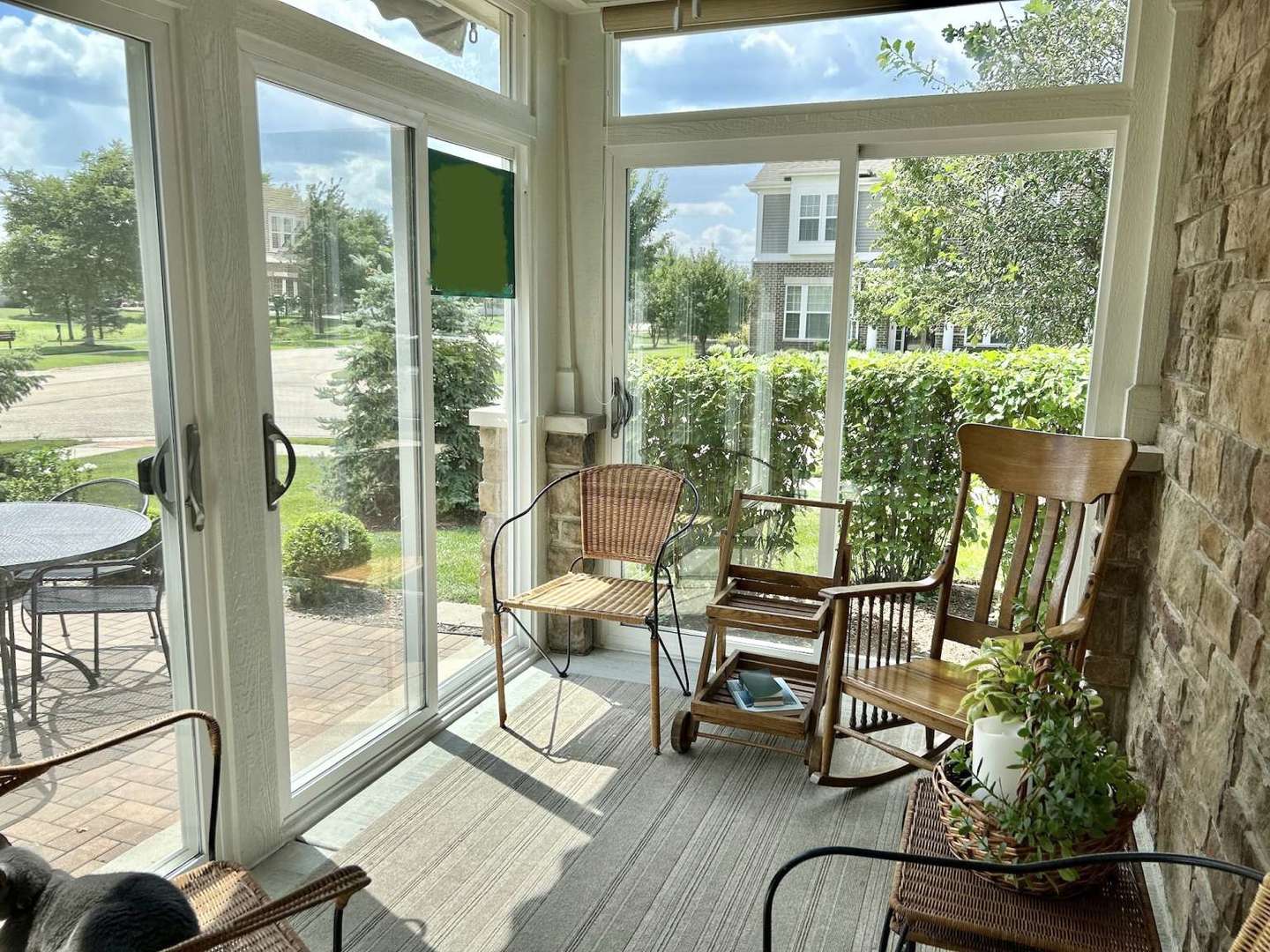 2603 Avondale Circle Naperville, IL 60564 - Photo 17 of 22 a view of a porch with chairs and backyard