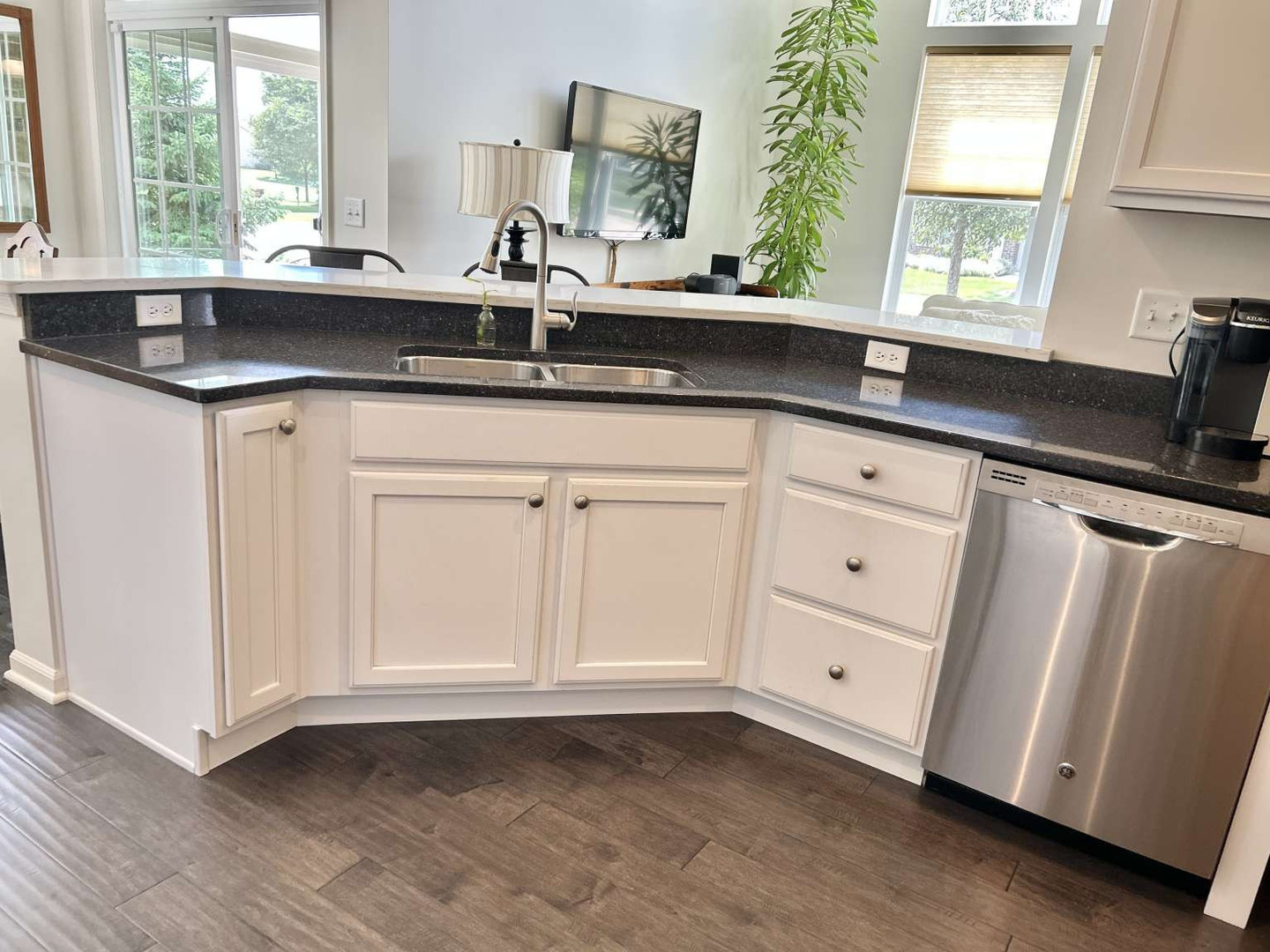 2603 Avondale Circle Naperville, IL 60564 - Photo 7 of 22 a kitchen with white cabinets and a window