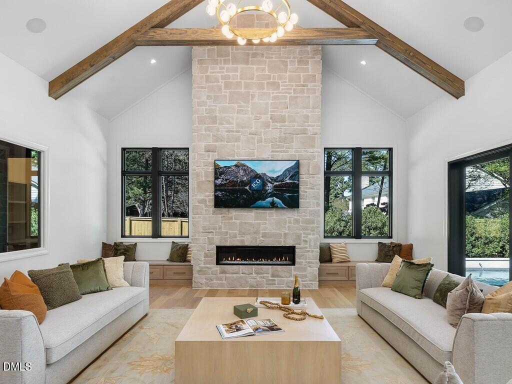 7013 Buckhead Drive Raleigh, NC 27615 - Photo 16 of 80 a living room with furniture and a fireplace