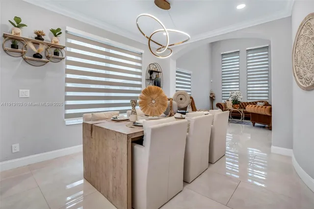 a kitchen with cabinets a refrigerator and a stove