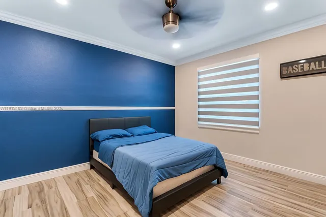 a view of swimming pool with a table and chairs