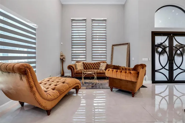 a large kitchen with stainless steel appliances kitchen island granite countertop a sink and cabinets