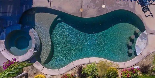 an aerial view of a swimming pool