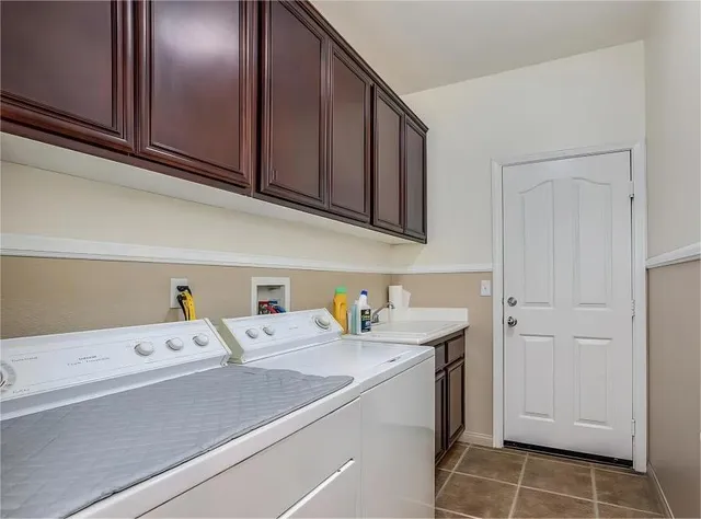 a utility room with a sink