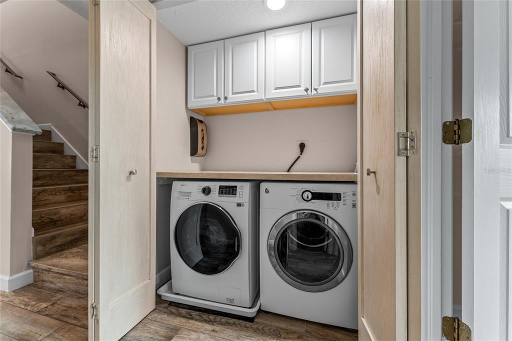 128 Marcdale Boulevard Indian Rocks Beach, FL 33785 - Photo 26 of 74 a utility room with dryer and washer