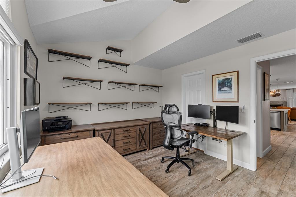 128 Marcdale Boulevard Indian Rocks Beach, FL 33785 - Photo 28 of 74 a view of a workspace with furniture and a window
