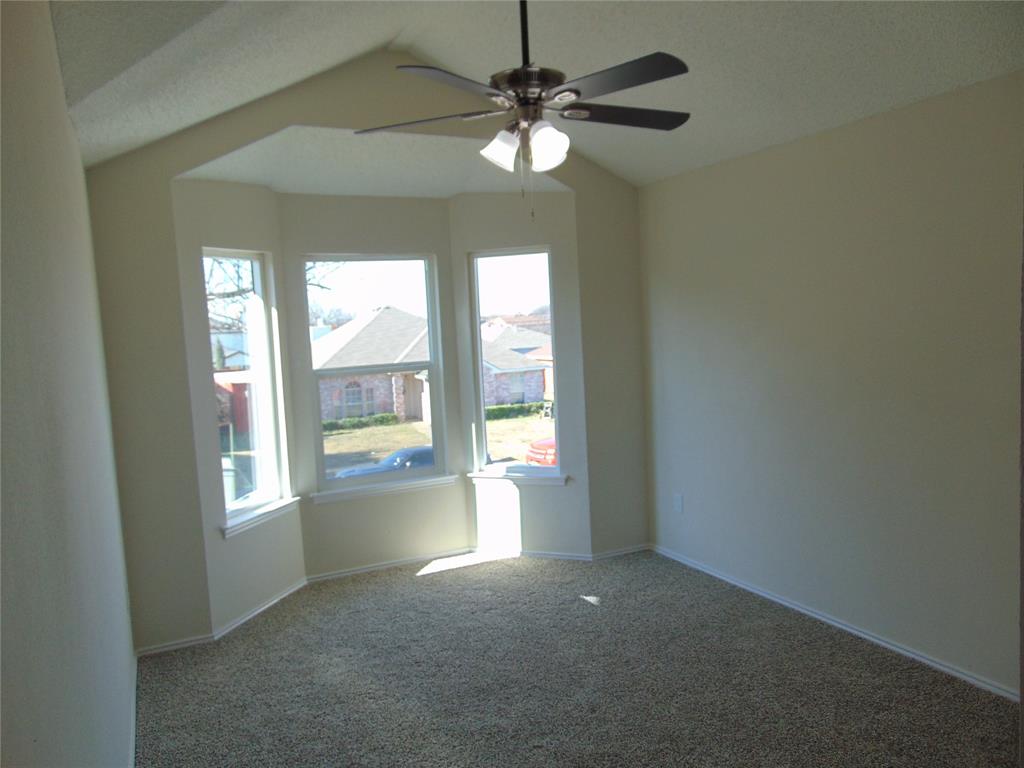 4912 Berridge Lane Dallas, TX 75227 - Photo 15 of 18 a view of an empty room with a window