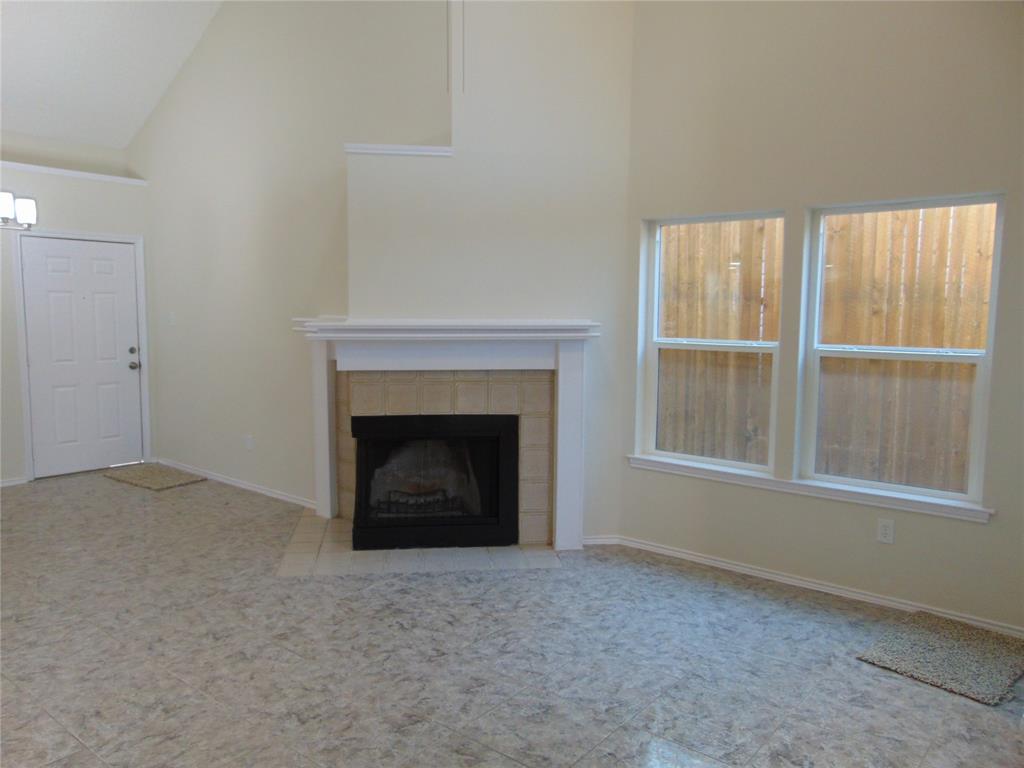 4912 Berridge Lane Dallas, TX 75227 - Photo 2 of 18 a view of an empty room with a window