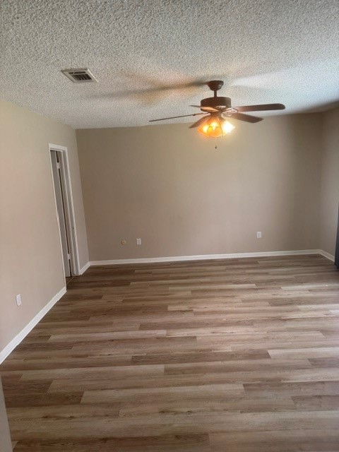 6026 Coral Ridge Road Houston, TX 77069 - Photo 22 of 34 New vinyl plank flooring through out the bedrooms and hallway.