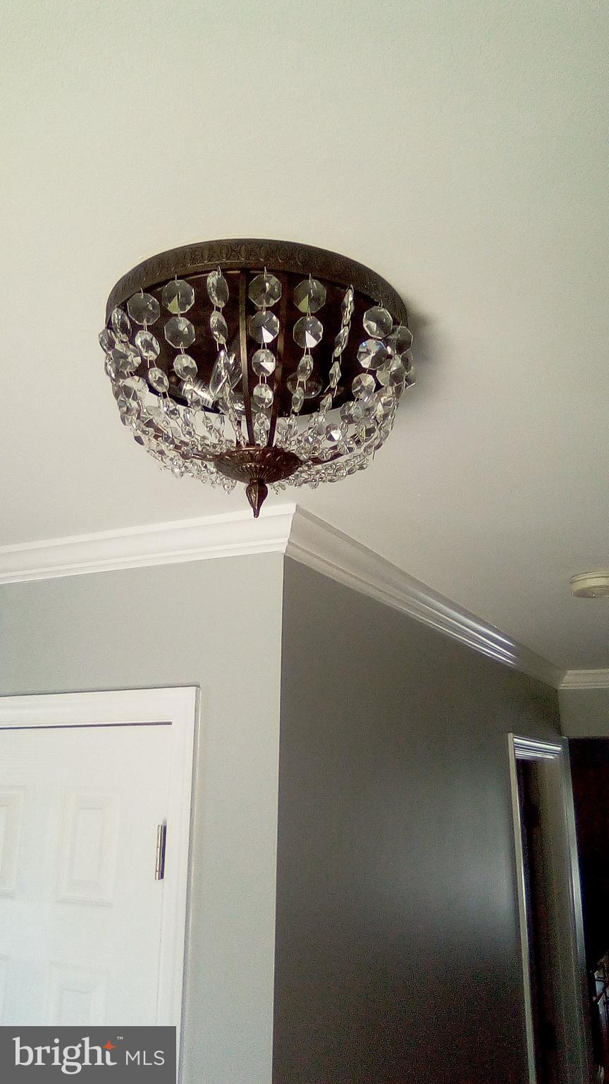 3524 Forest Hill Road Baltimore, MD 21207 - Photo 4 of 48 Up dated foyer light fixture