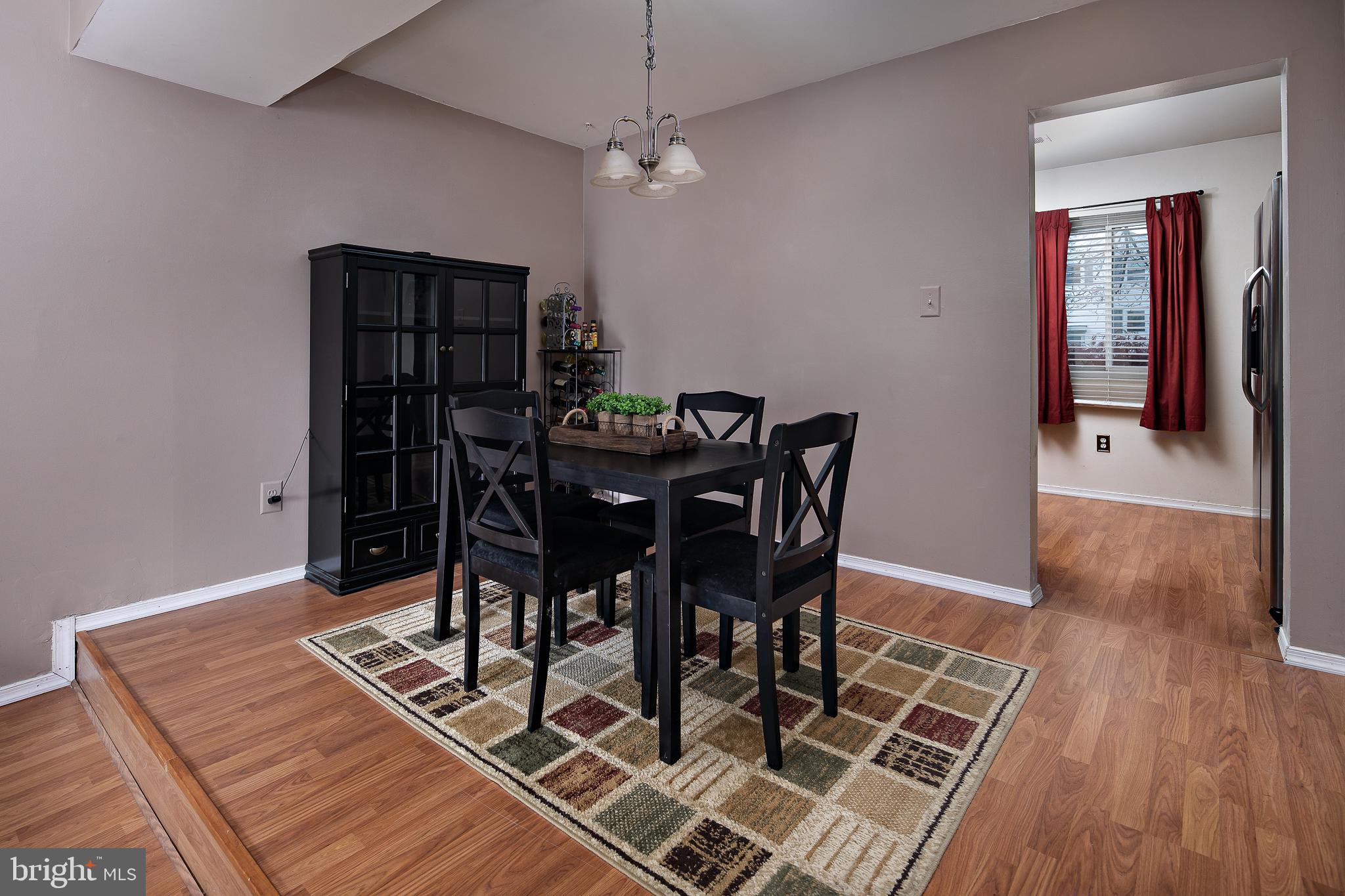 7529 Remington Road Manassas, VA 20109 - Photo 8 of 25 Separate Dining Room with warm hardwood