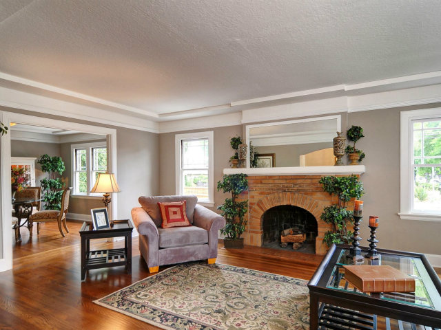 100 Stanley Road Burlingame, CA 94010 - Photo 3 of 14 a living room with furniture and a fireplace