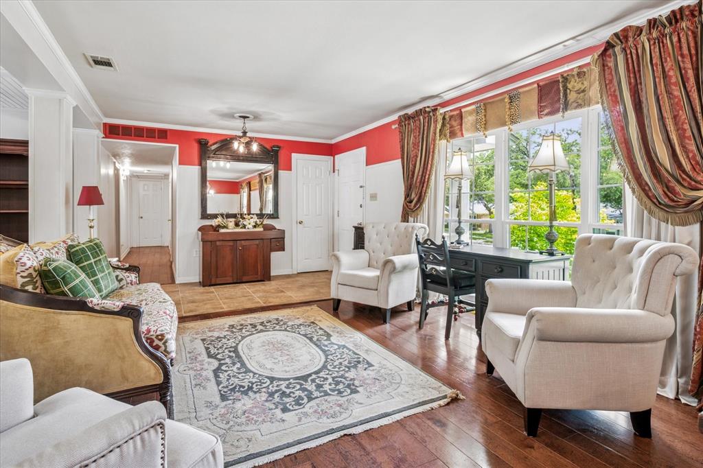 13429 Spring Grove Avenue Dallas, TX 75240 - Photo 13 of 25 a living room with furniture and a large window