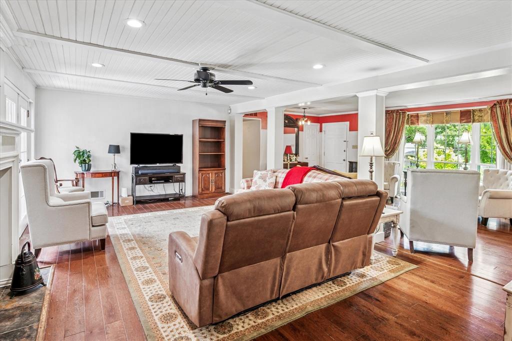 13429 Spring Grove Avenue Dallas, TX 75240 - Photo 4 of 25 a living room with furniture and a flat screen tv