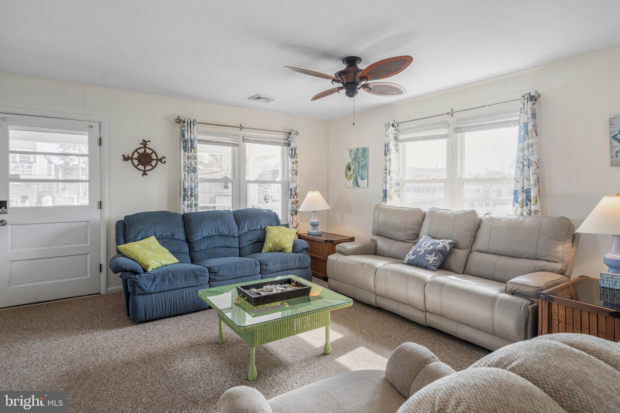 30200 Kent Road Dagsboro, DE 19939 - Photo 14 of 48 a living room with furniture and a window