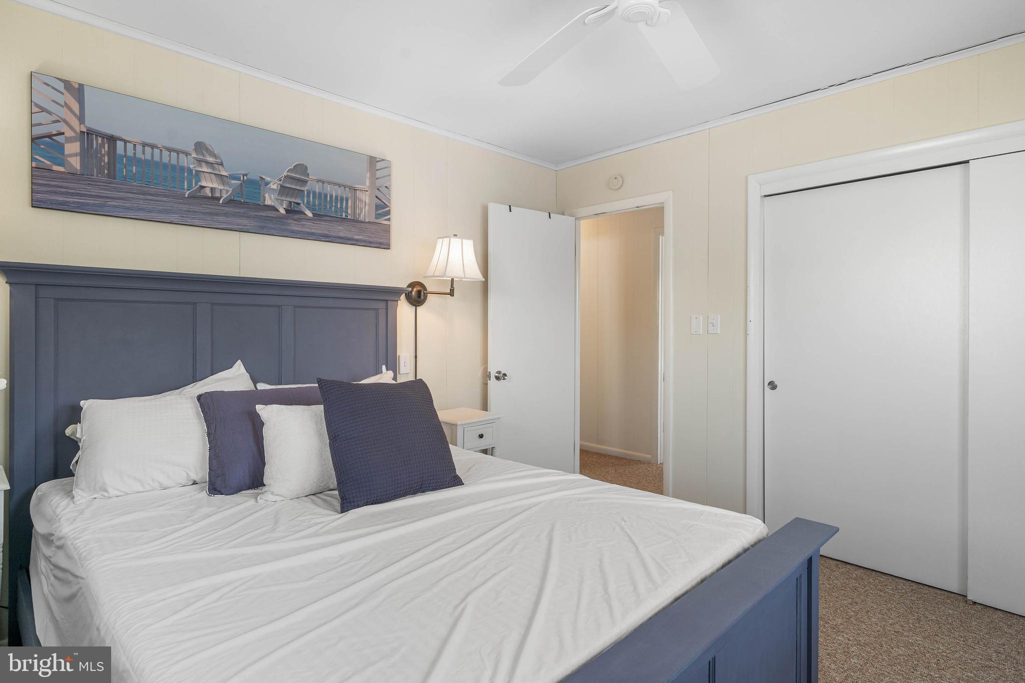 30200 Kent Road Dagsboro, DE 19939 - Photo 18 of 48 a bedroom with a bed and night stand