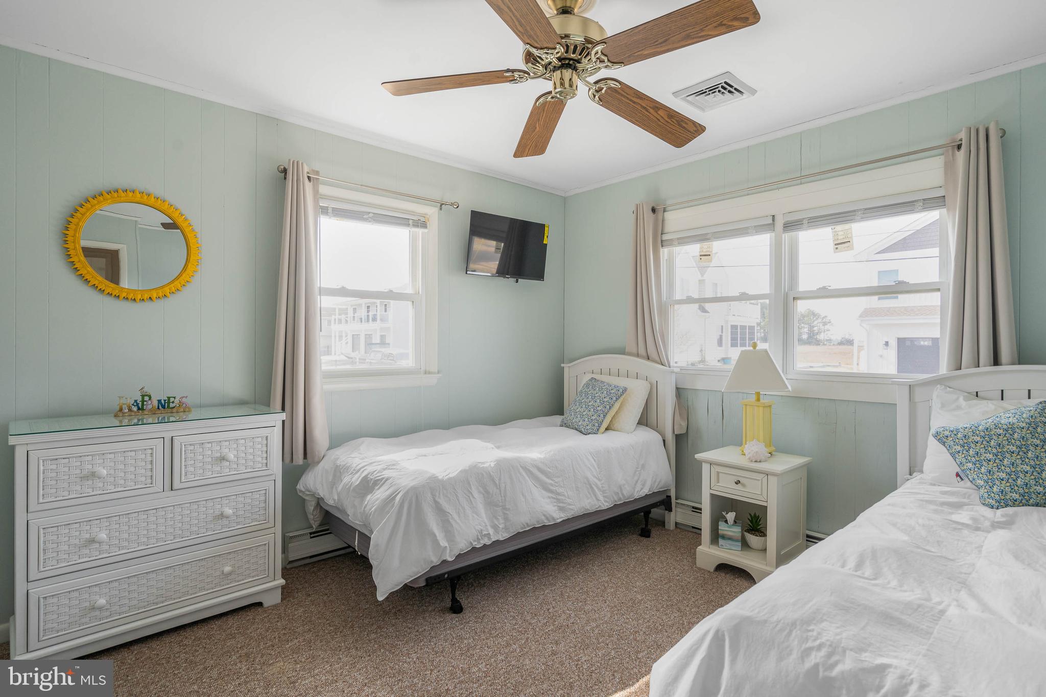 30200 Kent Road Dagsboro, DE 19939 - Photo 19 of 48 a bedroom with a bed and a window