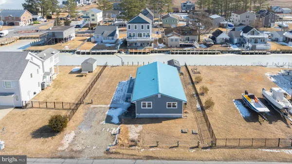 a front view of a house with a ocean view
