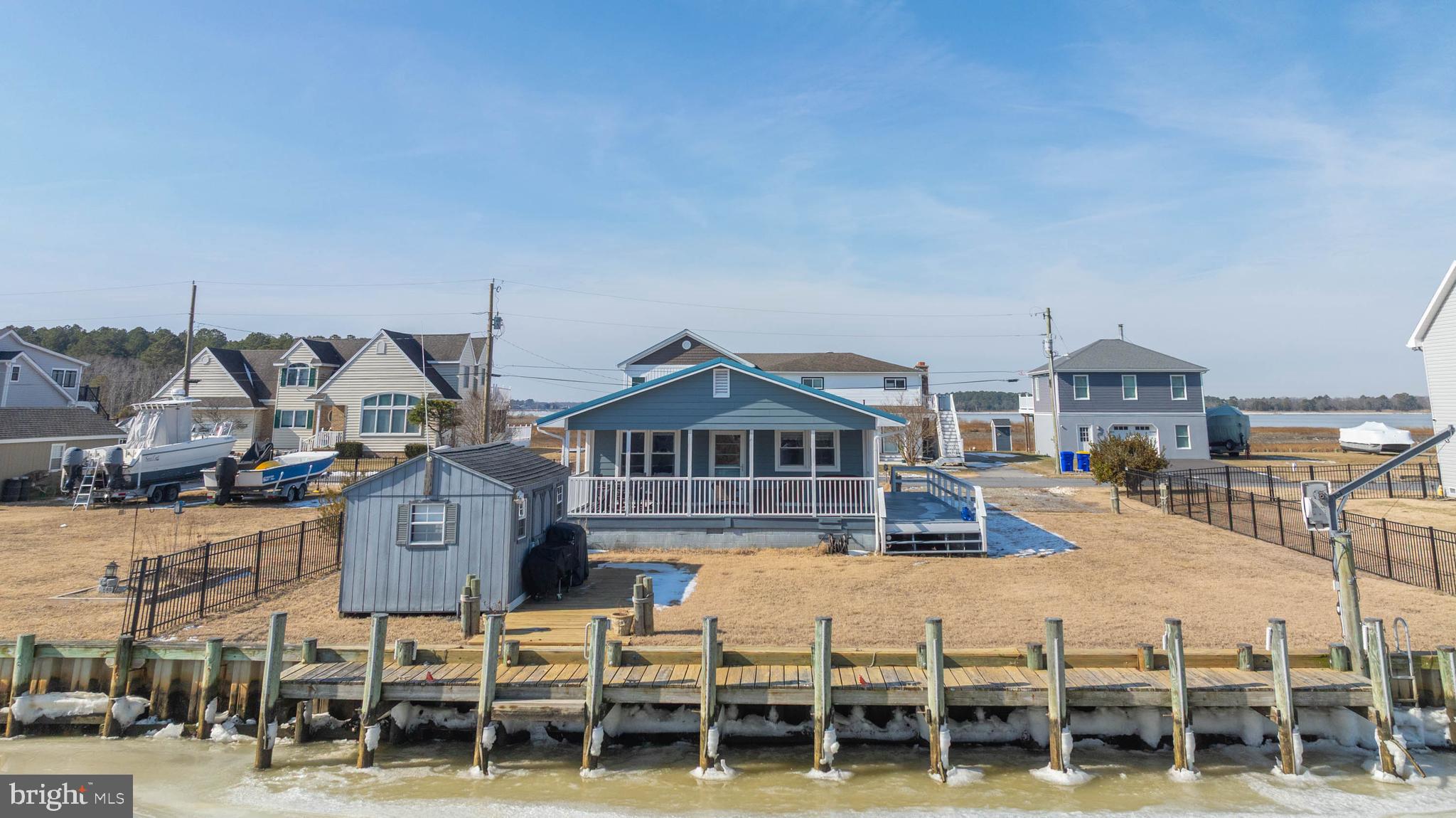 30200 Kent Road Dagsboro, DE 19939 - Photo 28 of 48 a front view of a house with a ocean view