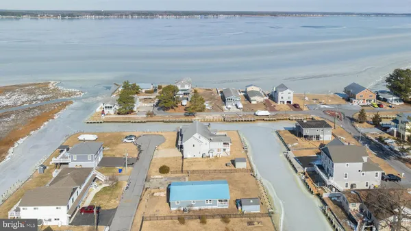 an aerial view of a house with swimming pool