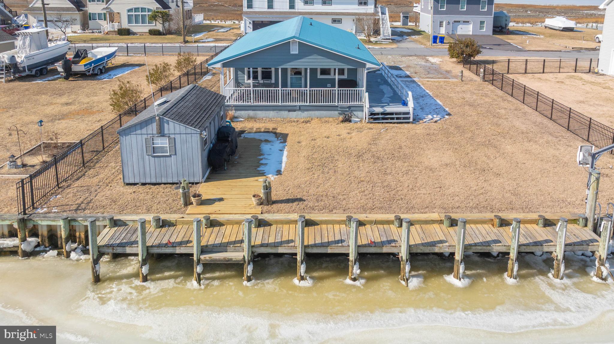 30200 Kent Road Dagsboro, DE 19939 - Photo 37 of 48 an aerial view of a house with swimming pool