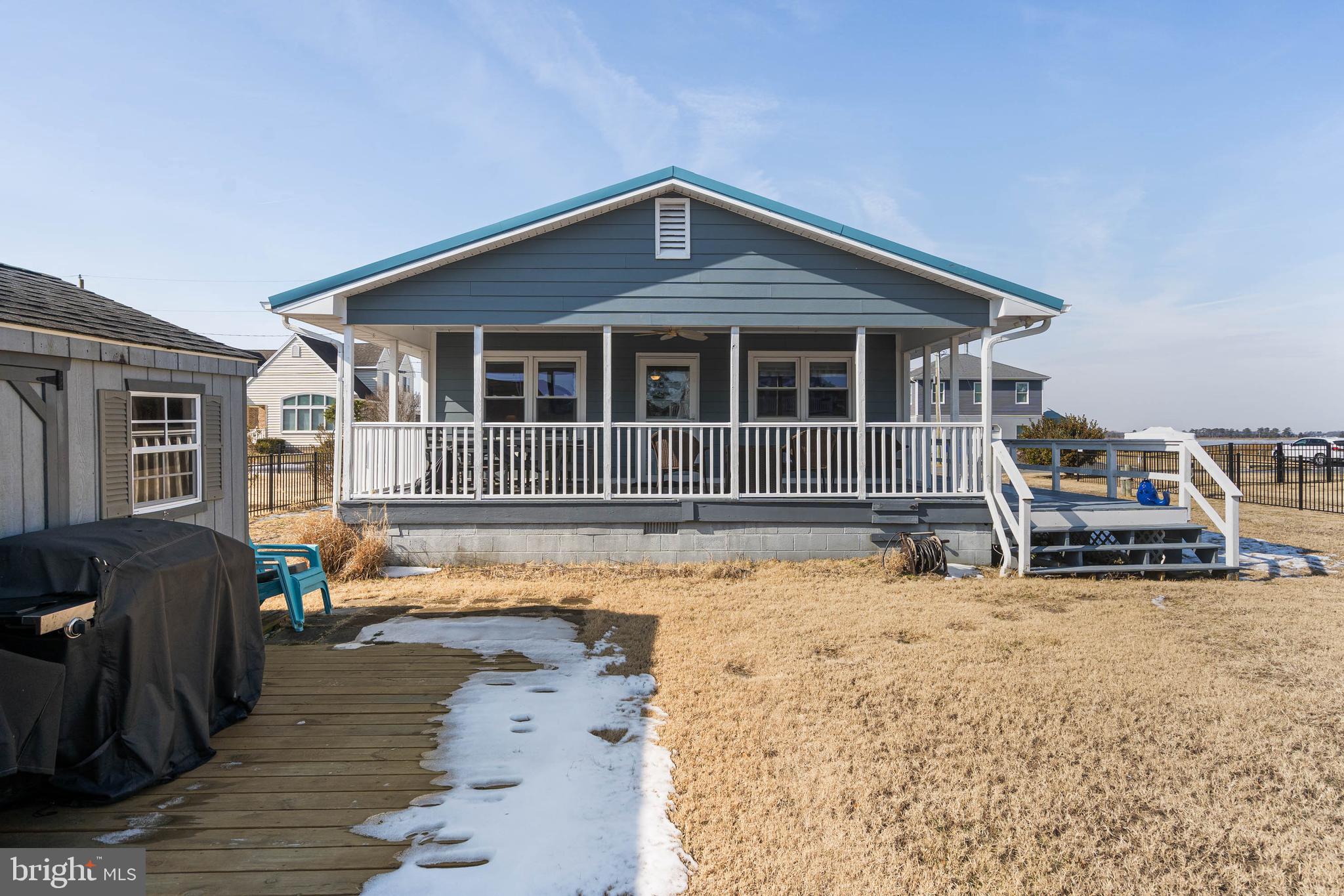 30200 Kent Road Dagsboro, DE 19939 - Photo 38 of 48 a front view of a house with a yard
