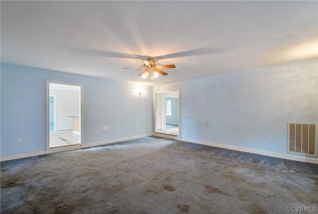 708 Buckner Road Bumpass, VA 23024 - Photo 13 of 40 a view of an empty room with a window