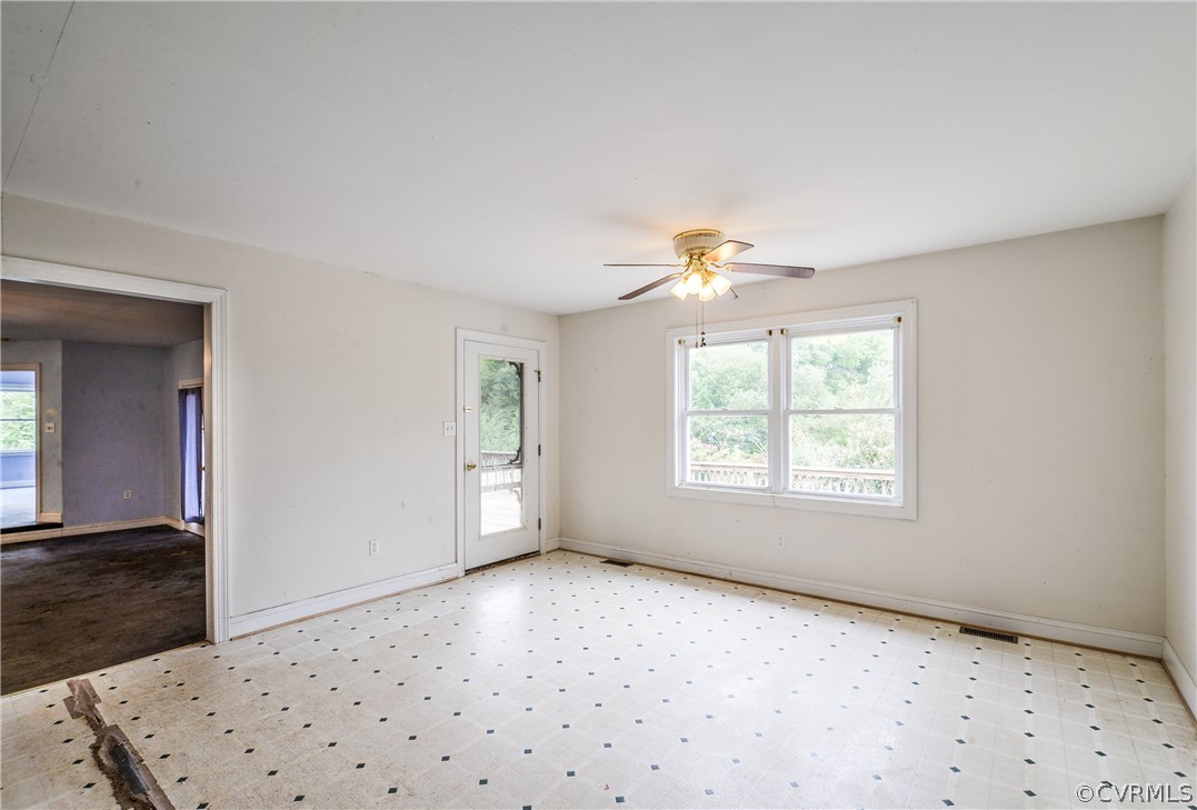 708 Buckner Road Bumpass, VA 23024 - Photo 23 of 40 a view of an empty room with a window