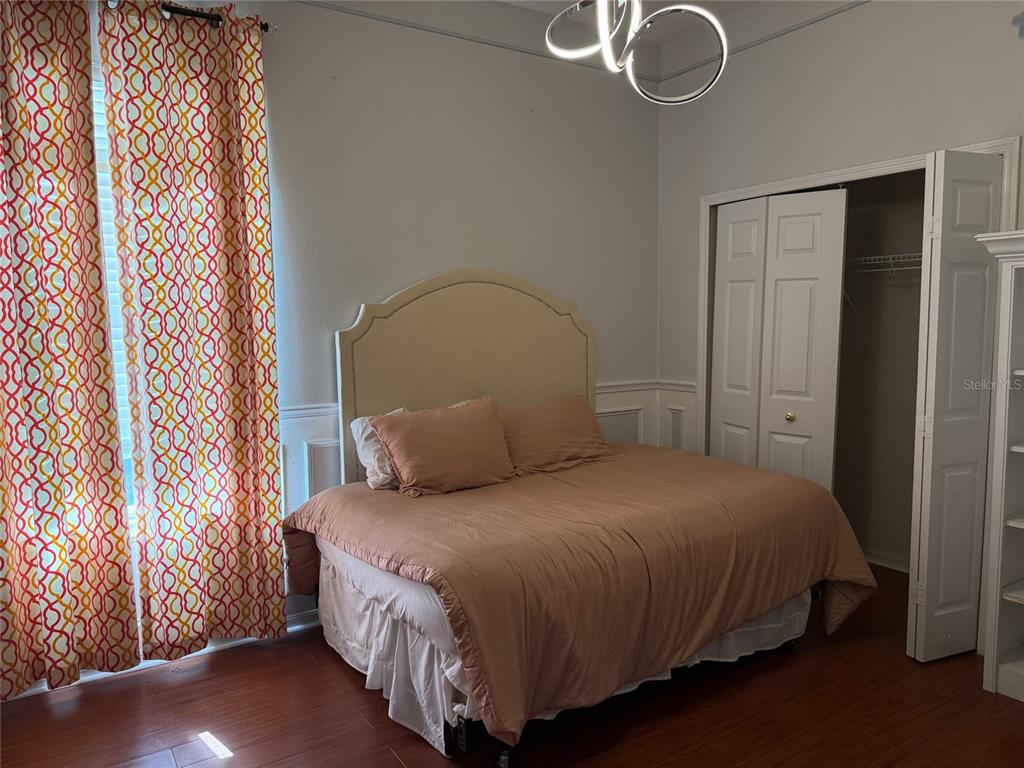 1146 Lumsden Trace Circle Valrico, FL 33594 - Photo 15 of 19 a bedroom with a bed and a window