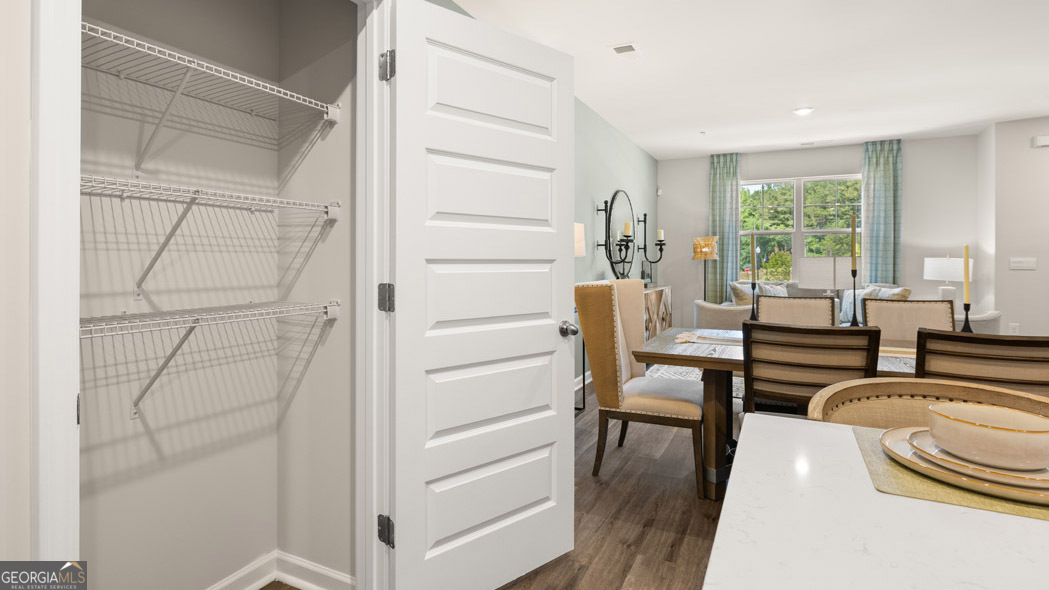 420 Reflection Drive Stockbridge, GA 30281 - Photo 24 of 58 a living room with furniture and a window