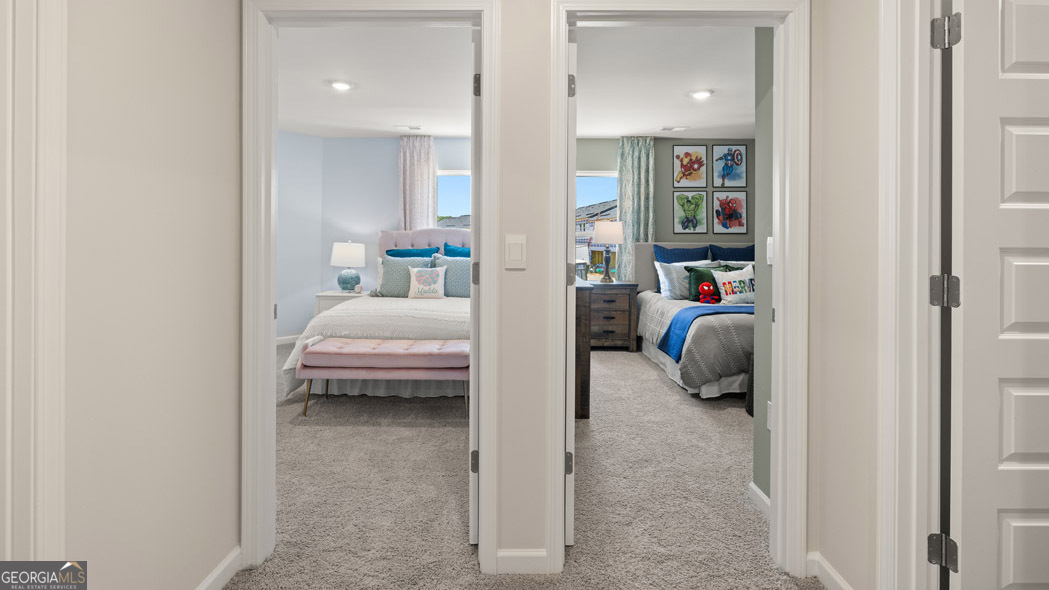 420 Reflection Drive Stockbridge, GA 30281 - Photo 51 of 58 a en suite bathroom with a sink and a mirror