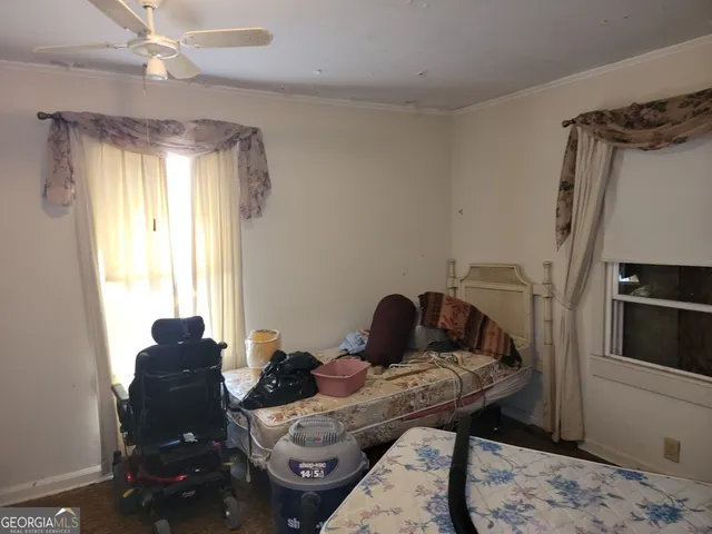 a view of a bathroom from a hallway