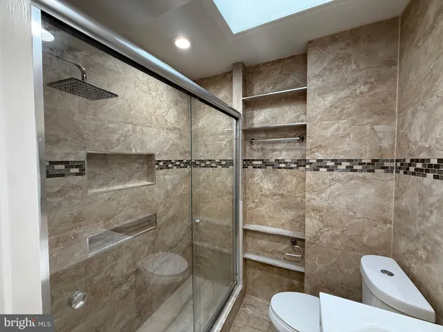 a view of a park with large trees