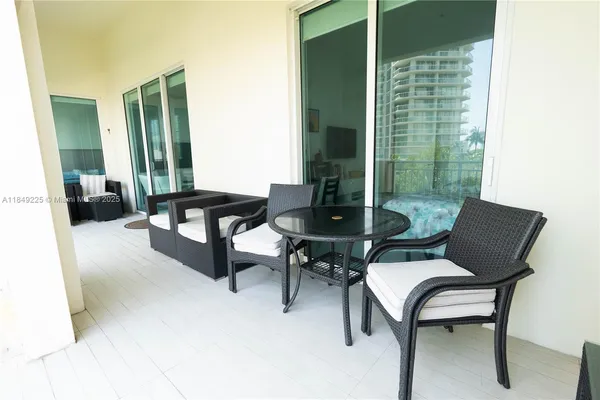 a outdoor living space with furniture and a potted plant