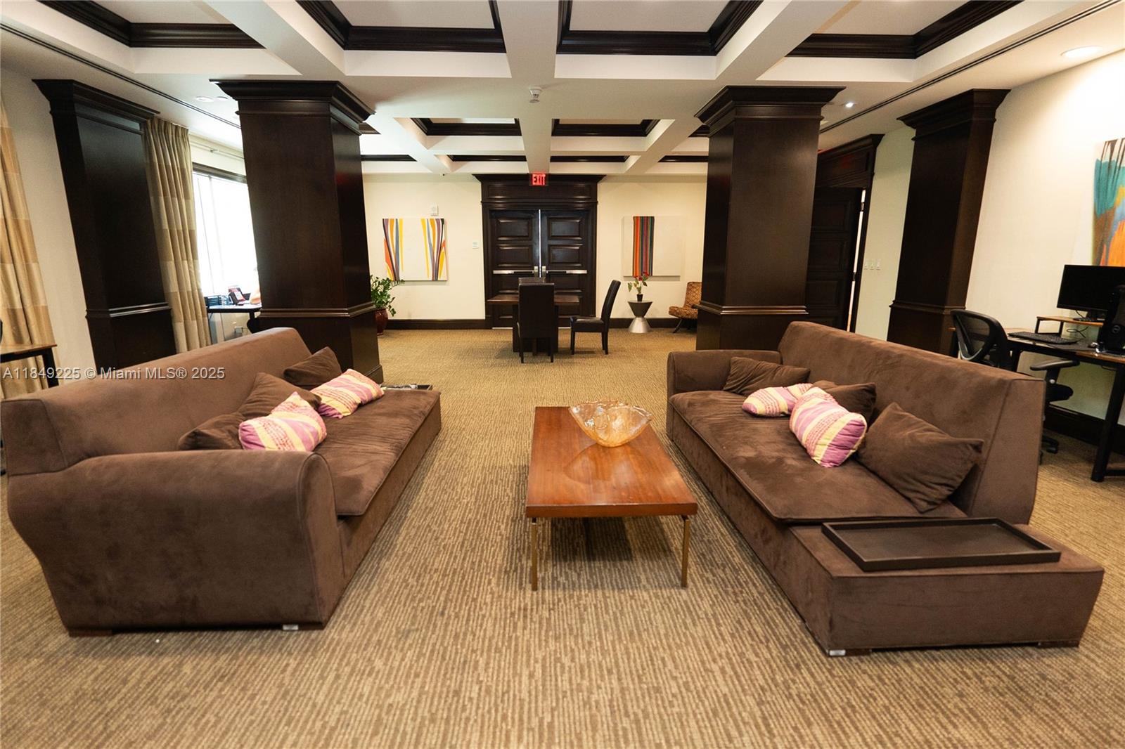 150 Sunny Isles Boulevard, Unit 1TH403 Sunny Isles Beach, FL 33160 - Photo 33 of 34 a living room with furniture and a wooden floor