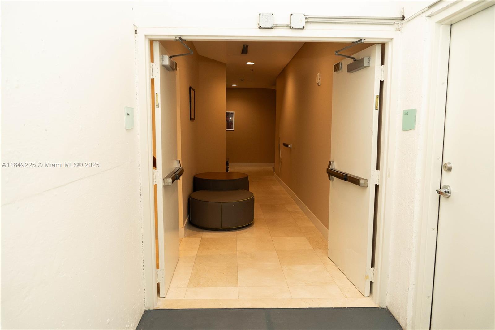 150 Sunny Isles Boulevard, Unit 1TH403 Sunny Isles Beach, FL 33160 - Photo 4 of 34 a bathroom with a sink and a mirror