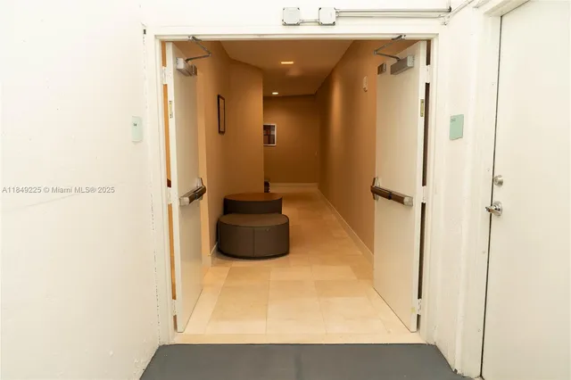 a bathroom with a tub and shower