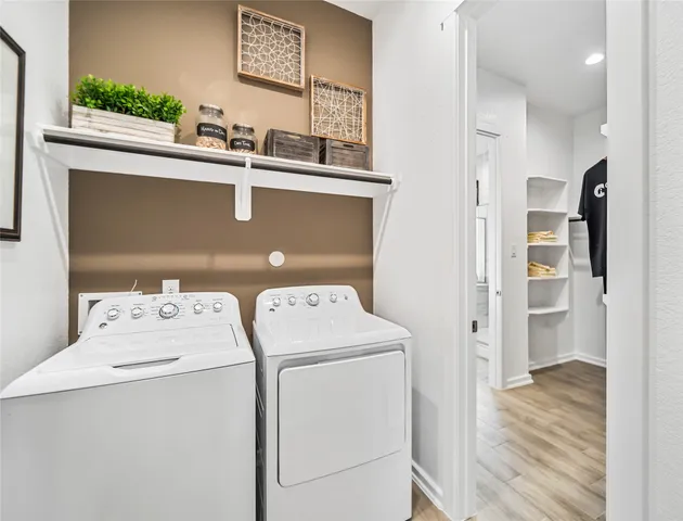 a utility room with dryer and washer