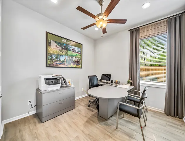 a living room with a couch and a window