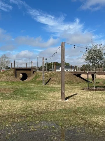 a view of a yard with a house