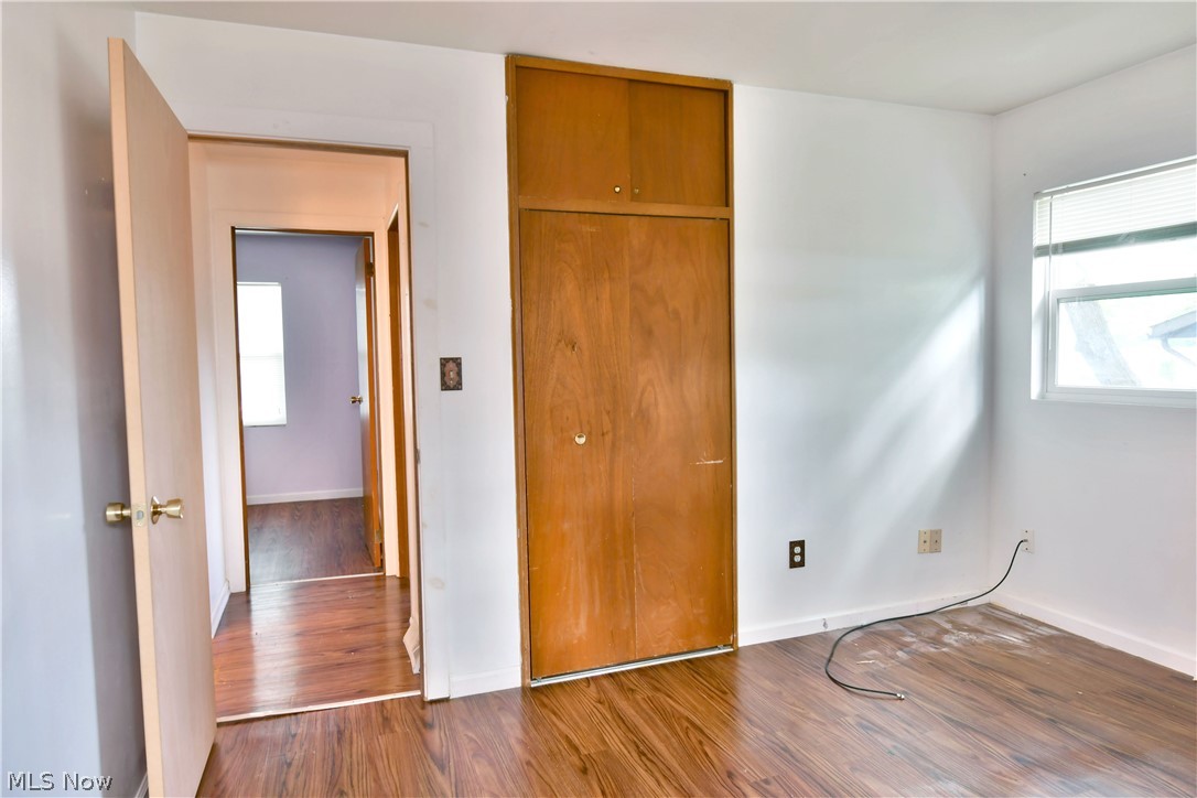2470 North Road Southeast Warren, OH 44484 - Photo 32 of 35 Unfurnished bedroom with hardwood / wood-style floors