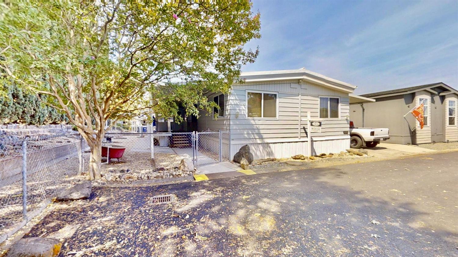 Large garden/yard area at a dead end as well as a wonderful covered wheelchair lift!