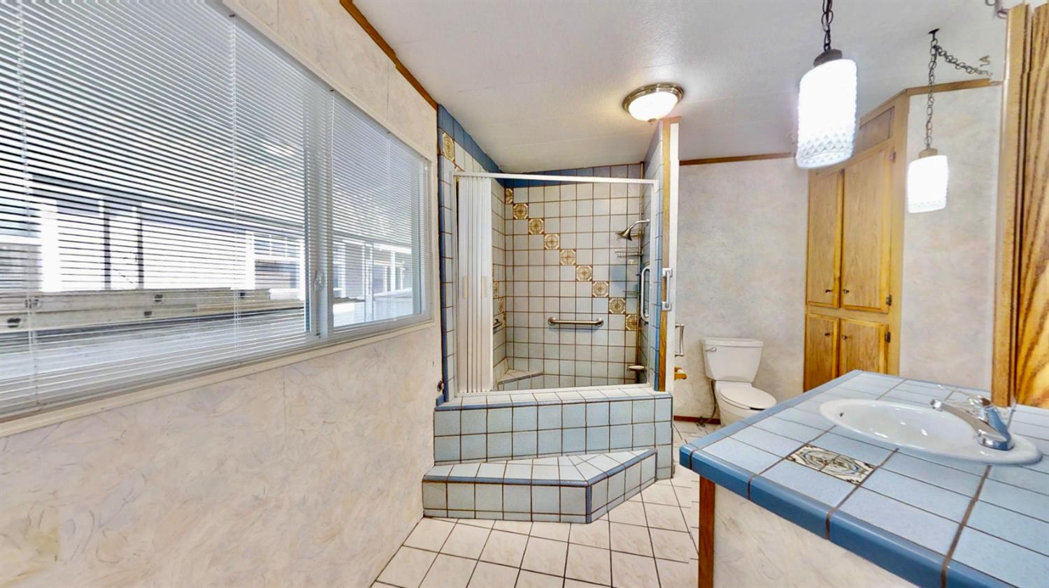 6203 Freedom Lane Citrus Heights, CA 95621 - Photo 26 of 51 Spacious tub and shower in the master bedroom with beautiful durable custom porcelain tile !