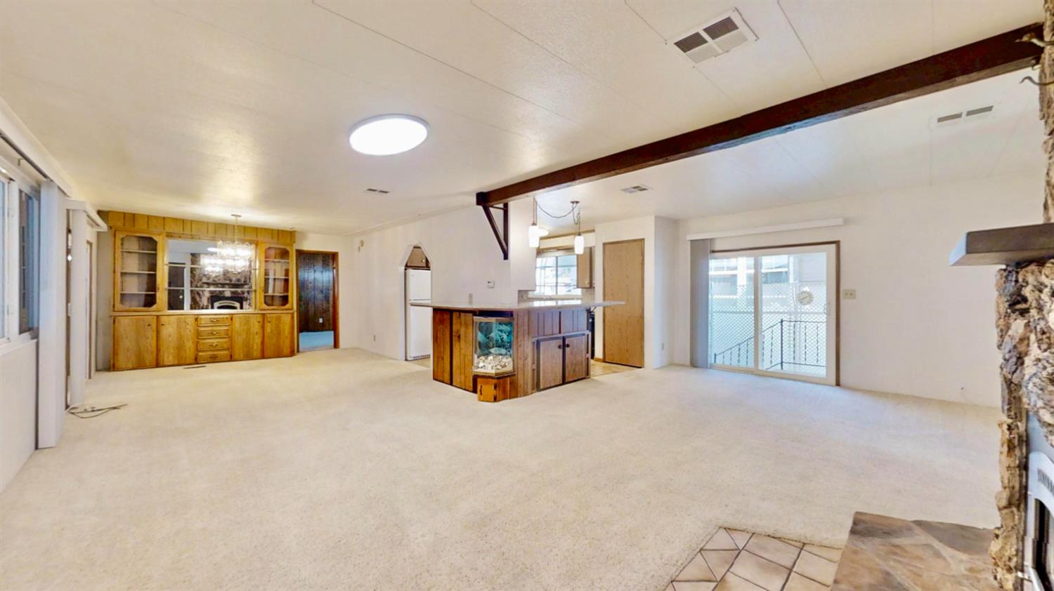 6203 Freedom Lane Citrus Heights, CA 95621 - Photo 5 of 51 spacious open formal living/dining room combo with a built in creature tank!